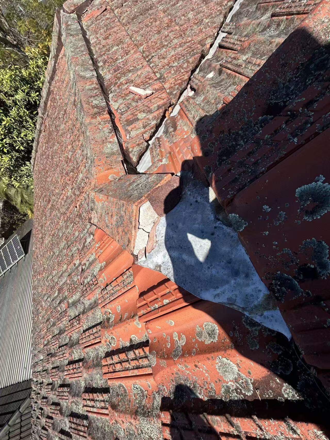 Several roof slopes meeting at a flashing junction